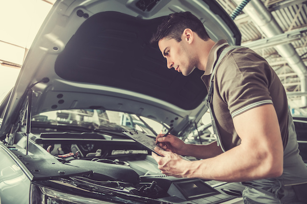Technician Performing a Virginia State Vehicle Inspection | Yates Automotive in Alexandria, VA